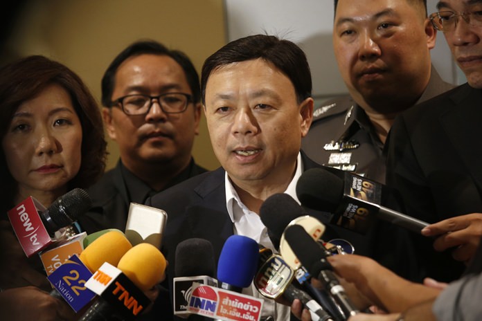 Thailand's National Broadcasting and Telecommunication Commission Secretary-General Takorn Tantasith talks to reporters in Bangkok, Tuesday, May 16. (AP Photo/Sakchai Lalit)