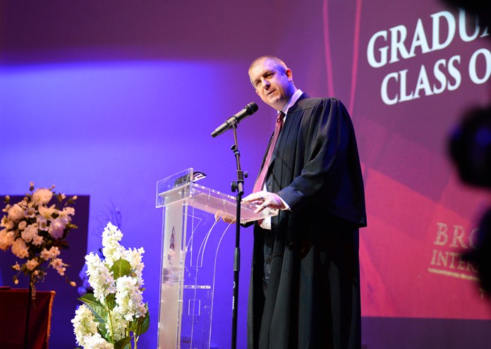 Head Master Dr. Daniel Moore addresses the new graduates on this special day.