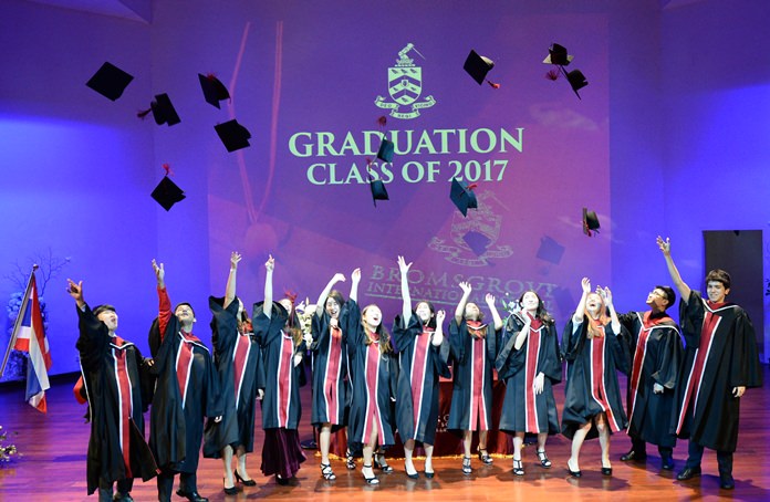 The traditional tossing of the mortarboard to signify the end of a chapter in a graduate’s life.