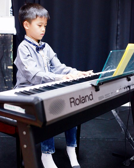 A young pianist at the Primary Recital.