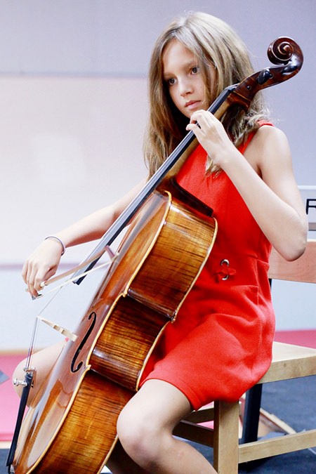 A gifted cello player performed at the GIS Primary Recital.
