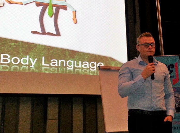 Jakob Friis posed three questions to his PCEC audience to introduce his topic, “Secrets of Body Language”. They were: What exactly is body language? How do you analyze body language and how can we use body language to our advantage?