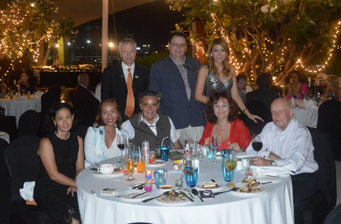 Members of the Rotary Club Phoenix Pattaya and guests gather for a group photo.