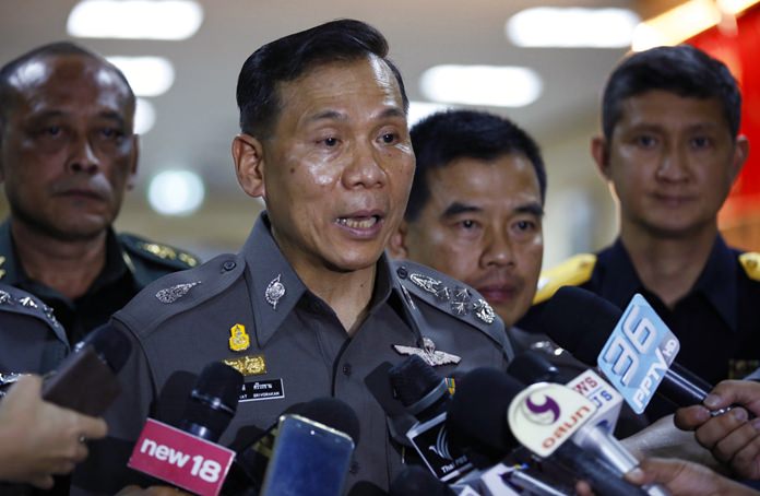 Deputy Police Commissioner Gen. Chalermkiat Sriworakhan talks to reporters at Royal Thai Police Headquarters in Bangkok, Thailand. (AP Photo/Kankanit Wiriyasajja)
