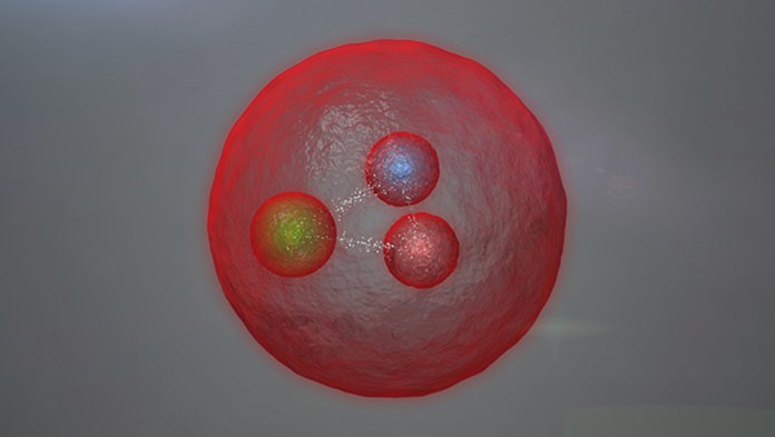 This image provided by CERN shows an artist’s conception of a new subatomic particle. The particle is the first of its kind to have two heavy quarks, both a type called “charm.” (CERN via AP