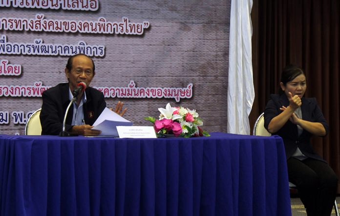 Pinit Sujinphrom, advisor to the Association for the Mentality Ill of Thailand, hosts the eminar at the Redemptorist Vocational School for Persons with Disabilities.