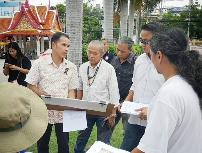 Pattaya Cultural Council President Mana Yaprakham and local officials check Chaimongkol Temple’s preparation to host a mirror ceremony for the cremation of King Rama IX in October.