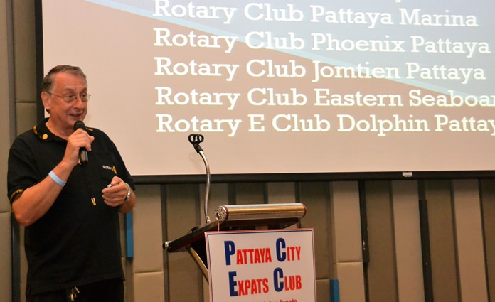 Carl Dyson, treasurer and past president of the Rotary Club Eastern Seaboard presents a slide that shows they are one of several Rotary Clubs located in Pattaya.