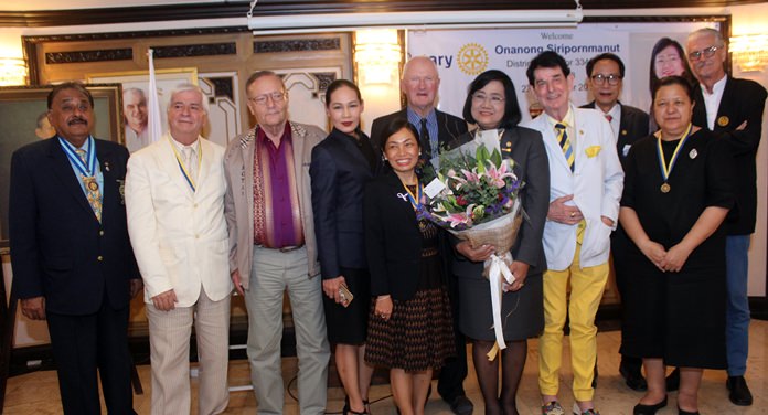 Members of the Rotary Club of Jomtien-Pattaya gather for a group photo with DG Onanong.