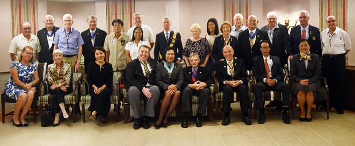 Members of the Rotary Club Eastern Seaboard gather for a group photograph with DG Onanong Siripornmanut.