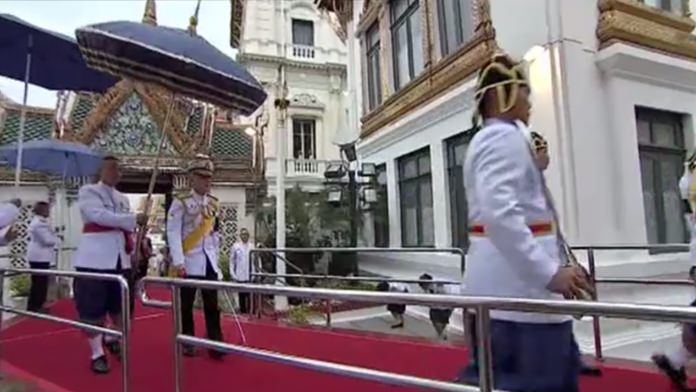 His Majesty King Maha Vajiralongkorn arrives at the Dusit Maha Prasat Throne Hall in the Grand Palace in order to make merit for the late King Rama IX.