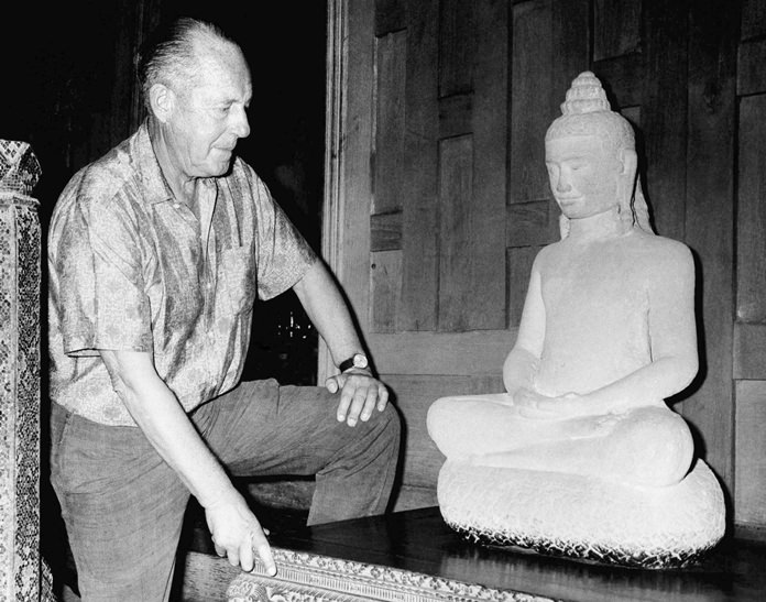 American businessman Jim Thompson views a Buddha statue in Bangkok in this November 1966 file photo. (AP Photo)