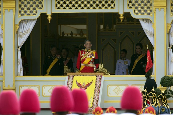 HM King Maha Vajiralongkorn, center, and Princess Maha Chakri Sirindhorn, left, participate in the funeral procession and royal cremation ceremony of late Thai King Bhumibol Adulyadej in Bangkok. (AP Photo/Wason Wanichakorn)
