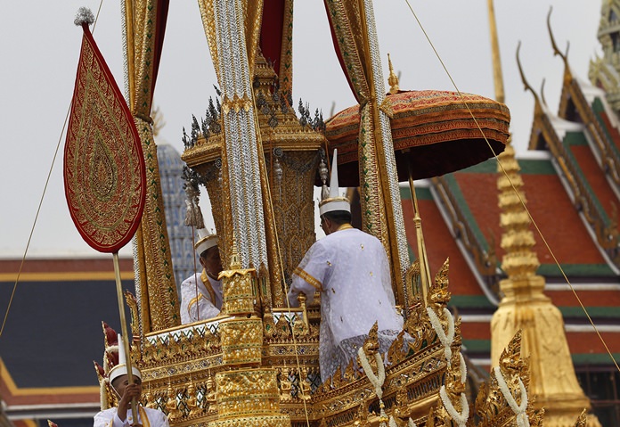 The symbolic urn is transported during the funeral procession of late Thai King Bhumibol Adulyadej in Bangkok, Thursday, Oct. 26, 2017. Bhumibol’s death at age 88 after a reign of seven decades sparked a national outpouring of grief and a year of mourning, culminating in an elaborate funeral and cremation ceremony last week.(AP Photo/Sakchai Lalit)