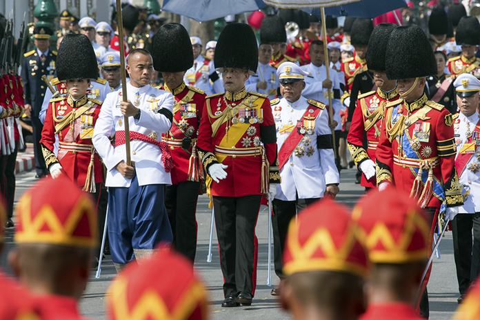 HM King Maha Vajiralongkorn participates at the funeral procession and royal cremation ceremony of late Thai King Bhumibol Adulyadej. (AP Photo/Kittinun Rodsupan)