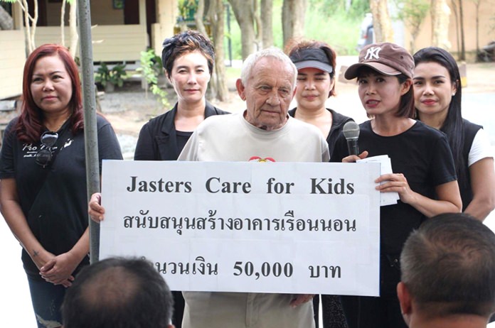 While thanking the donors Noi (right, with microphone), President of Pattaya YWCA and initiator of the project, made special mention of the Jesters donation.