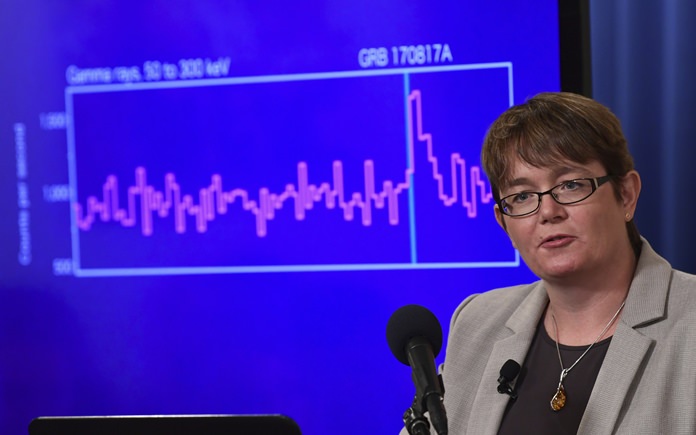 Julie McEnery, an astrophysicist at NASA’s Goddard Space Flight Center in Greenbelt, Md., speaks at the National Press Club in Washington, Monday, Oct. 16, 2017, during an announcement about one of the most violent events in the cosmos that was witnessed completely for the first time in August and tells scientists where gold and other heavy elements come from. (AP Photo/Susan Walsh)