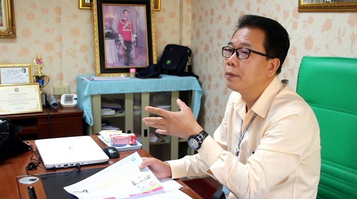 Sompol Jithiruengkiat of the Banglamung Health Department, warns residents to properly cook freshwater shellfish and snails to prevent infection from the potentially fatal Guinea worm.