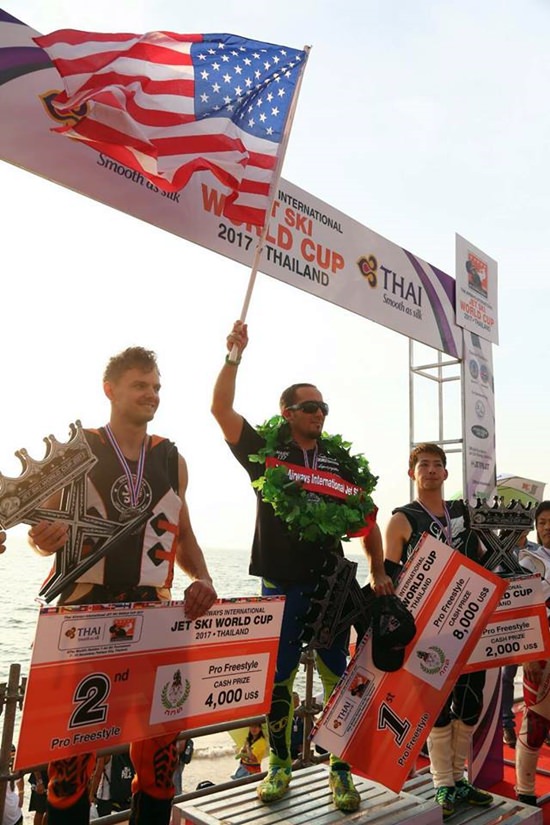 The top three in the Pro Freestyle category pose on the podium.