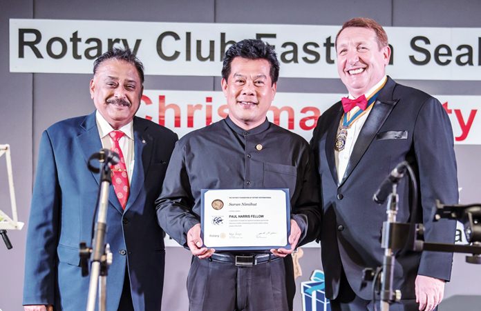 Saran Nimihut joins the ranks of distinguished persons around the world who are recognized as a Paul Harris Fellow. He is flanked by PDG Peter Malhotra and President Brian Songhurst.