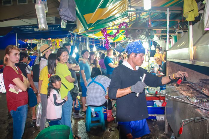 Local seafood vendors say their business is doing great, with three times the income of a normal day/night.