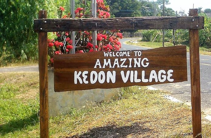 This is the sign that Brad Walker made and placed at the entrance of Kedon Village in Surin Province.