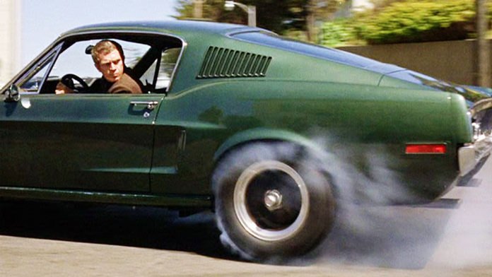 Steve McQueen and his Bullitt Mustang.