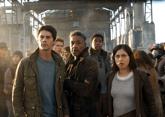 This image shows (foreground from left) Dylan O’Brien, Giancarlo Esposito and Rosa Salazar in a scene from “Maze Runner: The Death Cure.” (Twentieth Century Fox via AP)