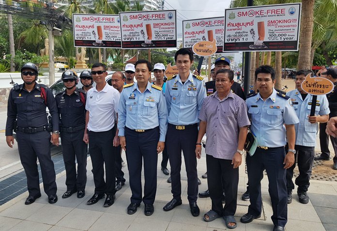 Thanet Munnoi, director of the Marine and Coastal Resource Management Office Chonburi led a squad of police officers to Jomtien Beach Feb. 1, the first day in which the three-month-old smoking ban was actually enforced.