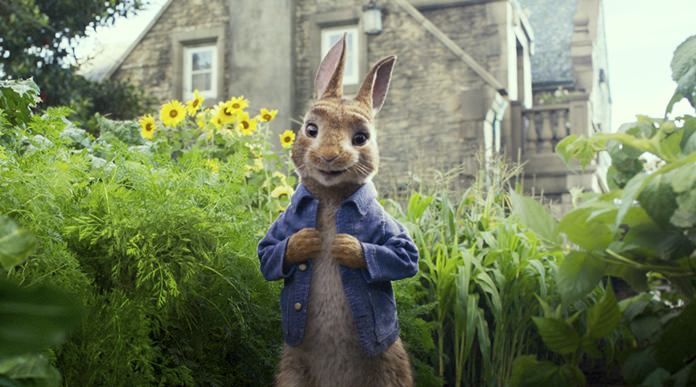 This image released by Columbia Pictures shows Peter Rabbit, voiced by James Corden, in a scene from “Peter Rabbit”. (Columbia Pictures/Sony via AP)