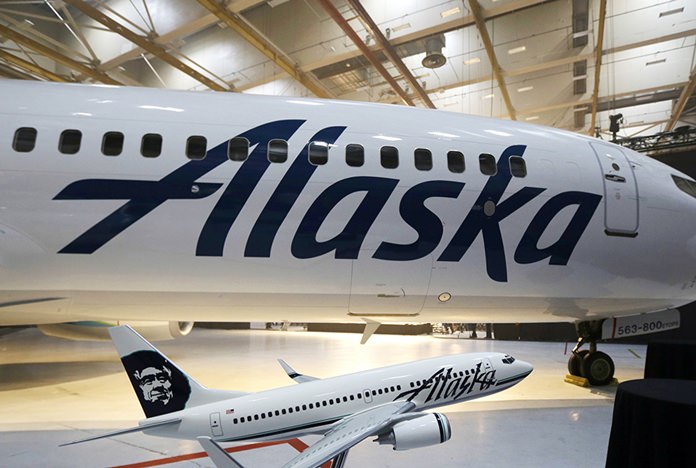 FILE - An Alaska Airlines flight to Seattle was forced to return to Anchorage, Alaska, early Wednesday, Feb. 7, 2018, after a passenger locked himself in the bathroom, took off all his clothes, and refused to follow crew instructions. (AP Photo/Ted S. Warren)