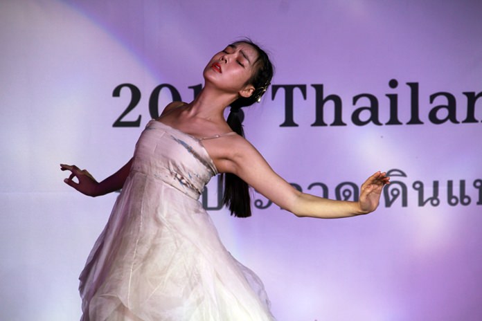 An actress performs during the Central Festival Pattaya Beach celebration for 60 years of Thai-Korean friendship.