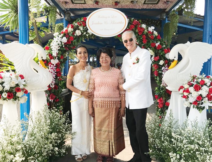 Jo and Noi receive blessings from Khun Mae Wang the bride’s mother.