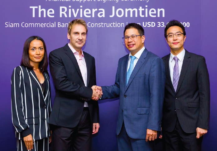 The Billion Baht handshake: (l-r) Sukanya and Winston Gale, owners of The Riviera Group, with Siam Commercial Bank’s Executive Vice President Thanawatn Kittisuwan and Executive Vice President Multi-Corporate Parnu Chotiprasidhi.