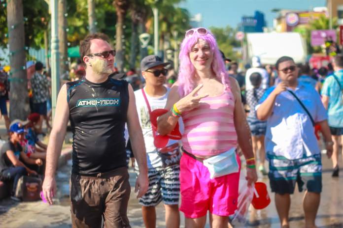 What else but a tourist wearing a pink wig.