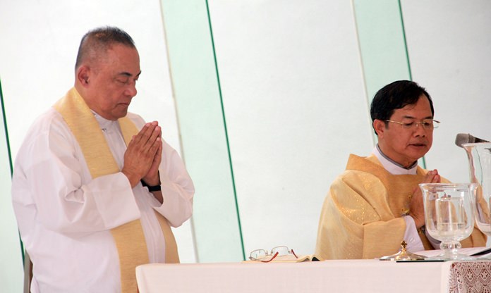 Father Corsie Legaspi (left) and Father Michael celebrate holy mass. 
