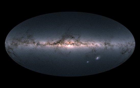 This image provided by the European Space Agency ESA, is Gaia’s all-sky view of our Milky Way Galaxy and neighboring galaxies, based on measurements of nearly 1.7 billion stars. (ESA via AP)