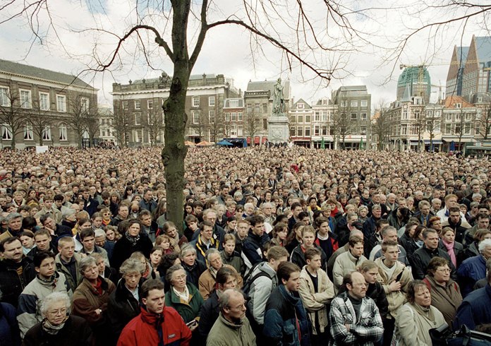 In this April 10, 2001 file photo, thousands demonstrate outside Dutch government buildings as the Upper House of Parliament debates the legalization of euthanasia at The Hague, Netherlands. In 2018, the Netherlands is one of five countries that allow doctors to kill patients at their request, and one of two, along with Belgium, that grant the procedure for people with mental illness. (AP Photo/Serge Ligtenberg, File)