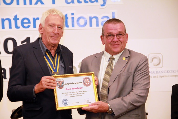 President Peter Schlegel welcomes Bruno Spornberger as a member of the Rotary Club of Phoenix Pattaya.