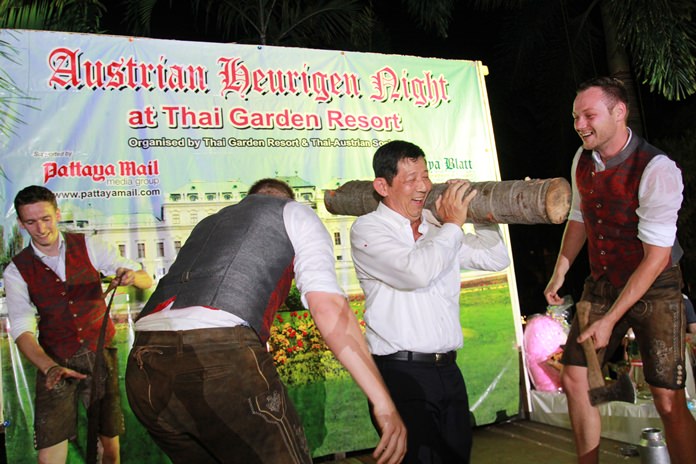 Mayor Anan joins in the ‘Holzhacker’ song and dance, then carries the fruits of his labour off the stage.