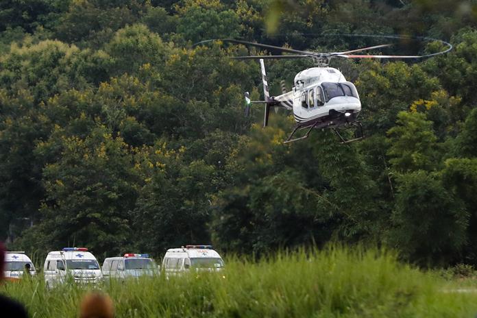 A helicopter believed to be carrying one of the rescued boys departs for the hospital Tuesday, July 10. (AP Photo/Vincent Thian)