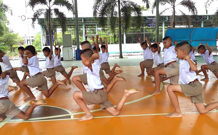 Children demonstrate their training exercises.