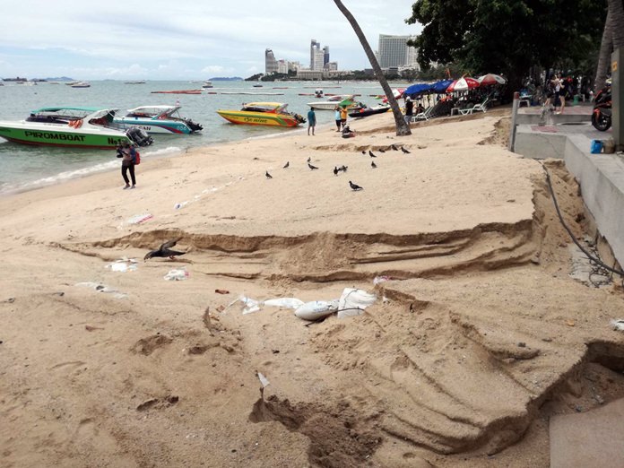 Heavy rain and flooding last week carved huge trenches out of the beach near the Pattaya Police Station. Pattaya officials said the sand-restoration project has only reached Soi 4, but when the work is finished at Soi 9 the area will be monitored to ensure that the new sand is not washed away.