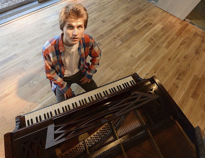 Tomasz Ritter, the Polish pianist who won the world’s 1st Frederic Chopin competition on pianos from the romantic era, poses for a photo in Warsaw, Poland, Friday, Sept. 21. (AP Photo/Czarek Sokolowski)