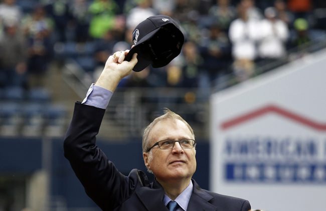 Paul Allen, who co-founded Microsoft with his childhood friend Bill Gates before becoming a billionaire philanthropist who invested in conservation, space travel, arts and culture and professional sports, died Monday. He was 65. (AP Photo/Elaine Thompson)