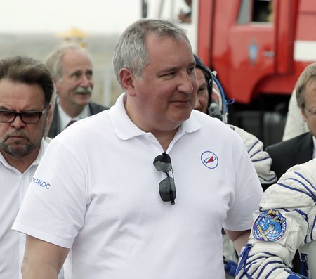 Roscosmos state space corporation head Dmitry Rogozin said in a video posted to Twitter on Saturday, Nov. 24, 2018, that a proposed Russian mission to the moon will be tasked with verifying that the American moon landings were real, though he appeared to be making a joke. (AP Photo/Dmitri Lovetsky, Pool Photo via AP, File)