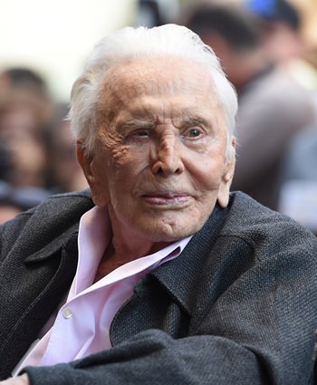 In this Nov. 6, 2018 file photo, actor Kirk Douglas attends a ceremony honoring his son actor Michael Douglas with a star on the Hollywood Walk of Fame in Los Angeles. (Photo by Chris Pizzello/Invision/AP)