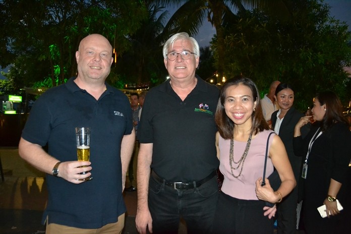 Adam Beechinor, GM Sirva Thailand, Frank Holzer, Executive General Manager of MHG Thailand Co., Ltd., and his charming partner.