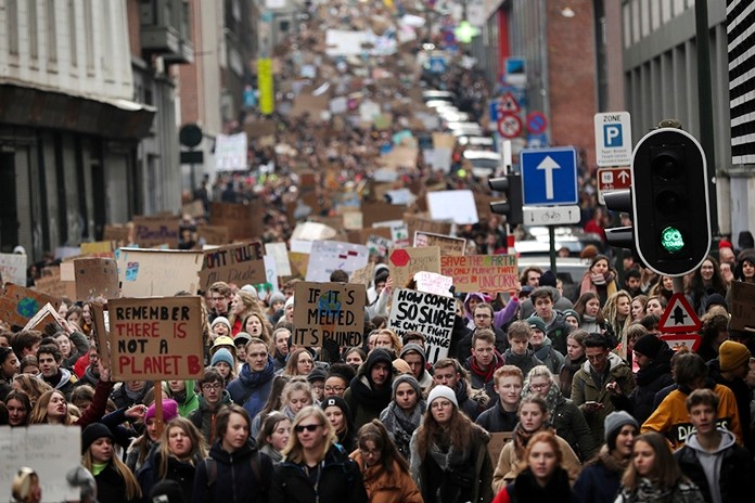 Thousands of youngsters crowd the streets as they march during a climate change protest in Brussels, Thursday, Jan. 31, 2019. Thousands of teenagers in Belgium have skipped school for the fourth Thursday in a row in an attempt to push authorities into providing better protection for the world’s climate. (AP Photo/Francisco Seco)