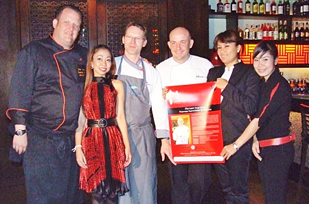 Friends welcome Michelin star chef, Thomas Kammeier (center) to Mantra Bar & Restaurant.
